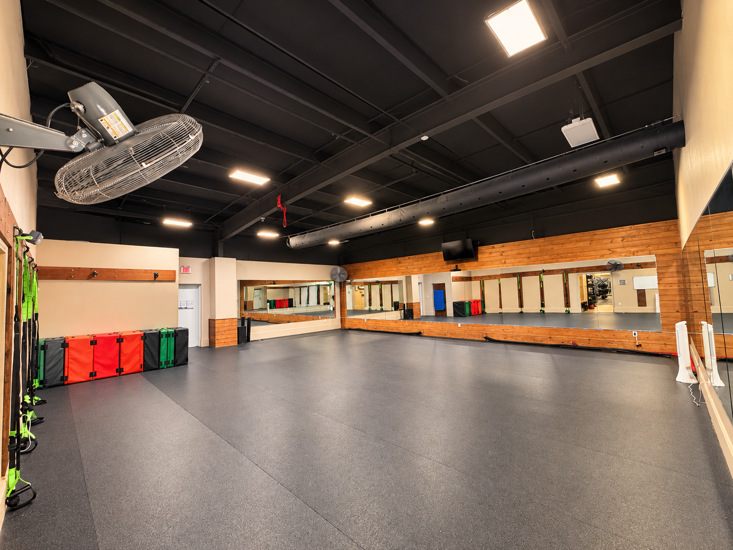 BFIT classroom with open workout space and mirrors